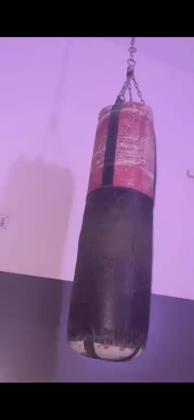 Heavy punching bag 5ft + chain -used 100% working-Urgent sale  “24hrs