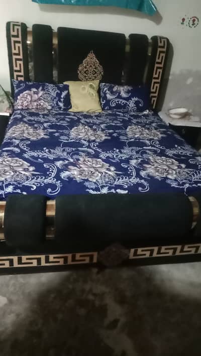 One bed and two side table