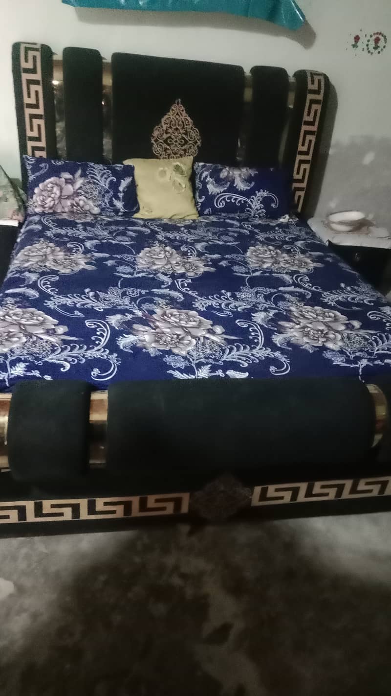 One bed and two side table 0