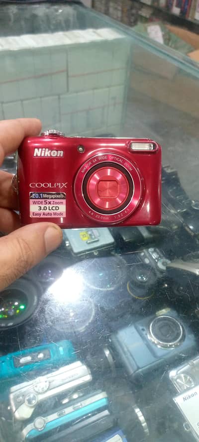 Nikon camera with rechargeable cell chager