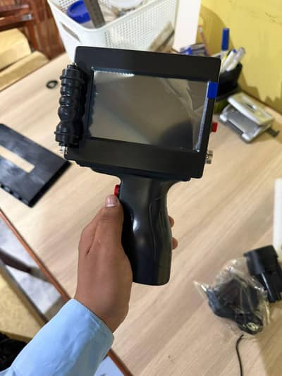intelligent handheld inkjet printer
