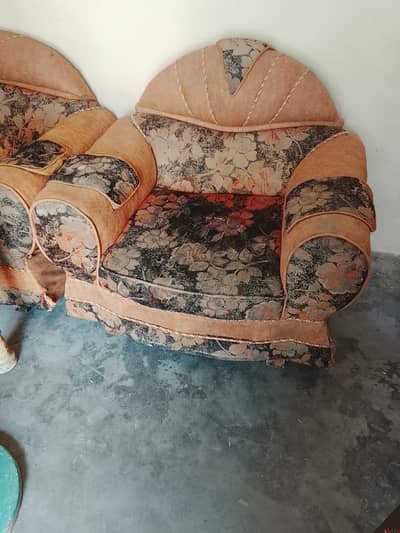 Used sofa set with one three seater and two single seater items -