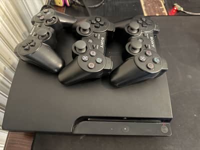 ps3 with 3 controllers and over 20+ games cds