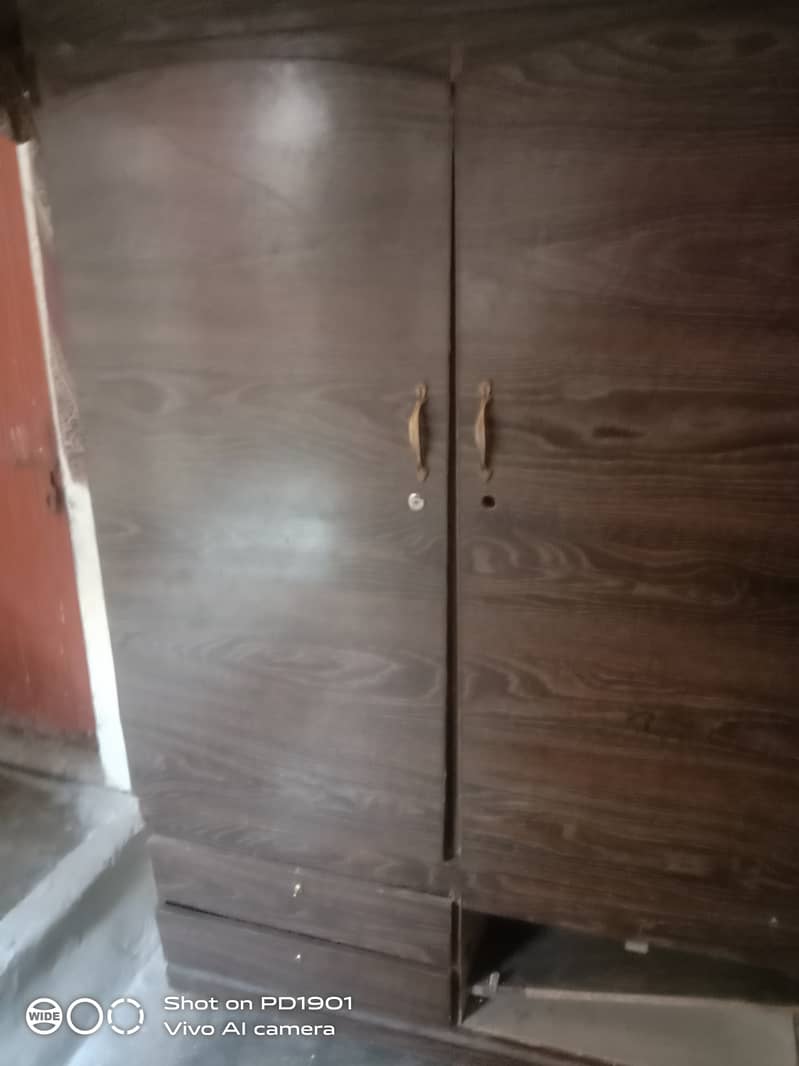 Bed + side table+ save almari 2