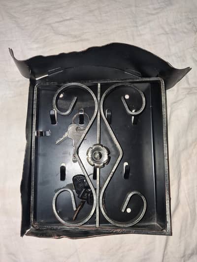 The vintage-style key cabinet.