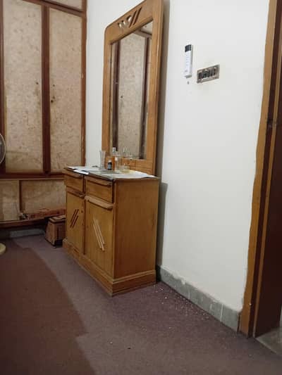 Wooden bed, side tables, dressing table