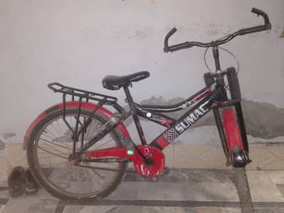 Sumac-branded youth bicycle Red&Black.