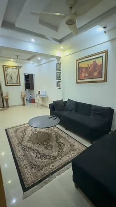E 11 furnished 1bed attached bath parking