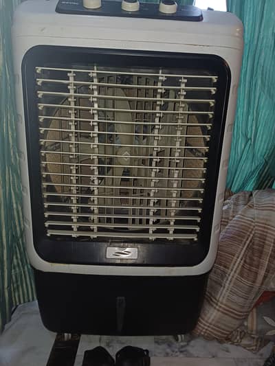 Royal fans indoor cooler.  In proper and good working condition