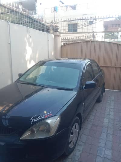 Mitsubishi Lancer 2004 total genuine paint