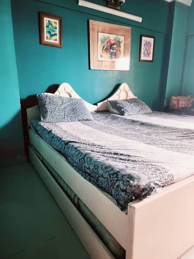 Bedroom beds (2) and a dressing table