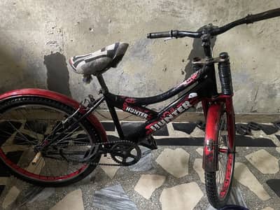 Red or black bicycle for sell contact me03249496866