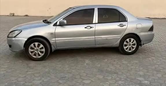 Mitsubishi Lancer model 2004 and register 2005 1300cc manual