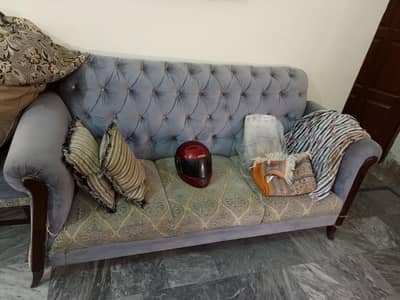 Sofa set with tables and chairs