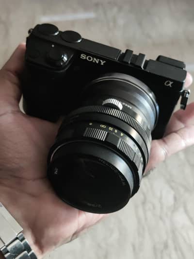 sony alpha nex7 mirror less dslr camera body with 50mm lens