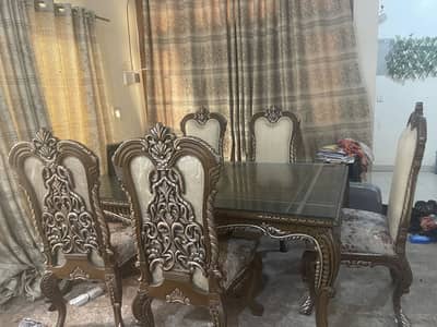 A beautiful Dinning Table set along with 6 chairs