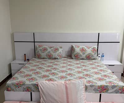 King-size bed with side tables & built-in storage