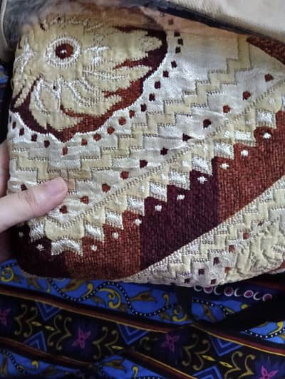 dark brown and golden bed sheets
