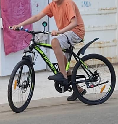 used Bicycles black n green full size bicycle