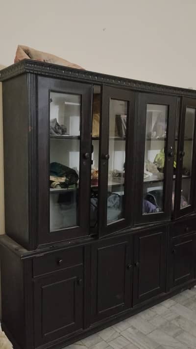 Wooden almari, multiple purposes, crockery, clothes anything.