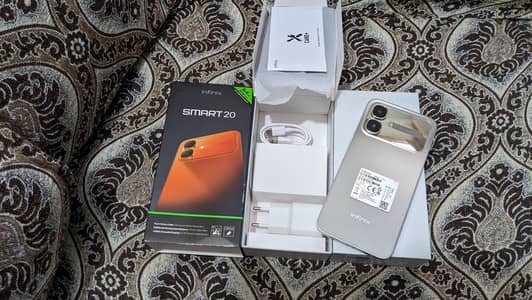 Infinix smart 20 box pack 15 days used  4+64
