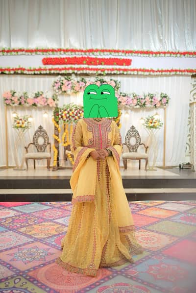 Mehendi frock by Maryam and Maria brand.