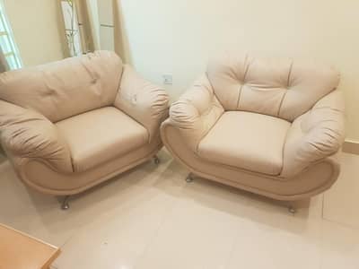 2 Single Sofa Chairs – Cream Leather | Good Condition | 5000 for each