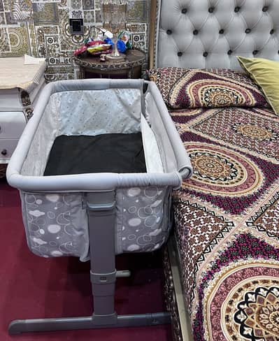 Baby crib next to me