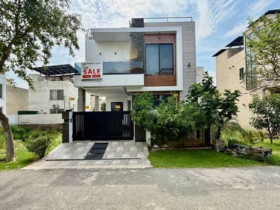 LIGHTLY USED BACK OF MAIN 120-FEET WIDE ROAD AND VERY NEAR TO PARK 5 MARLA ELEGANT AND FULLY MAINTAINED SUPER HOT LOCATED BUNGALOW IS AVAILABLE IN THE C BLOCK OF DHA 9 TOWN LAHORE.