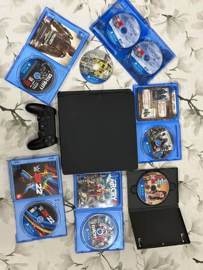 Sony PS4 Bundle + 7 Disc Games & GTA V Premium Account