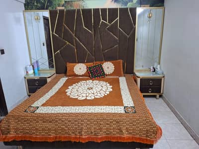 Bed with mattress and dresser