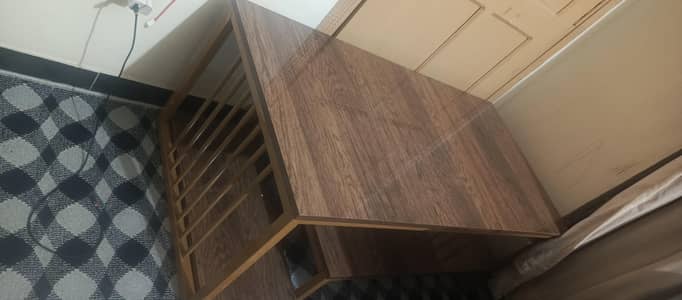 Table for sale and carpet and iron stand
