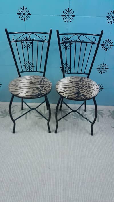 2_ iron chairs in superb condition