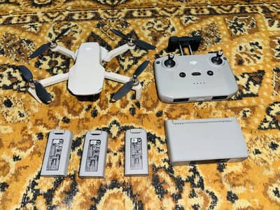 Dji mini 2se with 3 batteries and charging hub