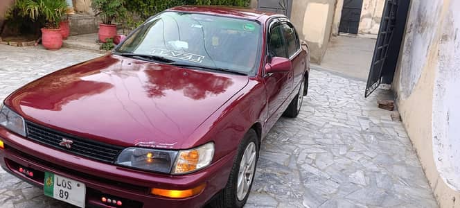 1993 corrola XE Maroon color