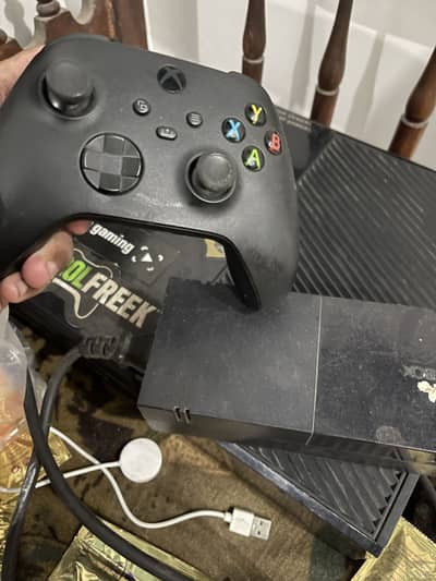 X box One with controller and supply