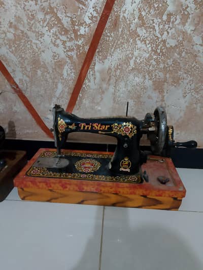 Cloth silai machine.