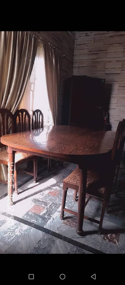 wood big size dining table with six chair