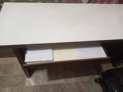 Used office table and height adjustable chair
