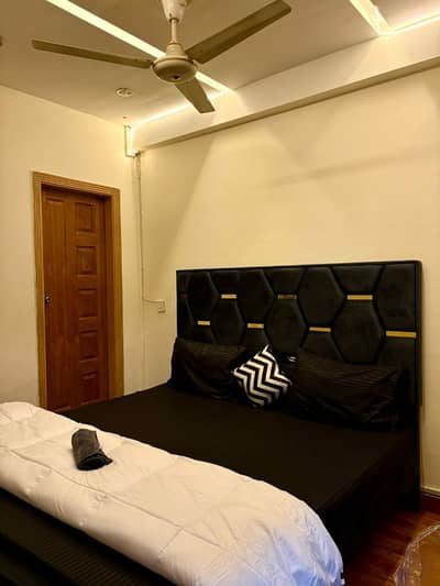 2 bedrooms apartment fully luxury furnished available for rent location E-11/2 KFC markaz