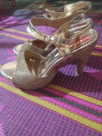golden stones heels size 7