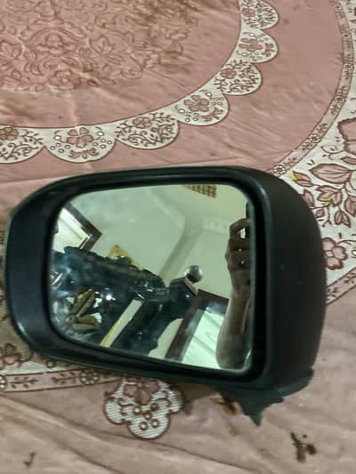 Totyota passo side mirror silver colour