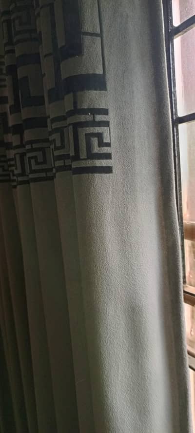 Fine boucle fabric curtain with velvet laser print.