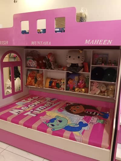 bunk bed with mattress and wardrobe