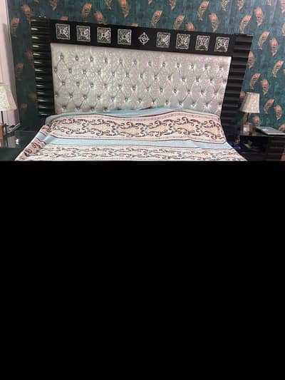 Bed, Side Tables and a Mirror