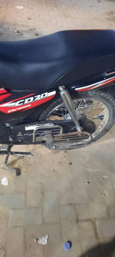 I am selling my honda cd dream 70cc bike biomatric on the spot total