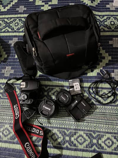 Canon EOS 1200D DSLR Camera with 2 Lenses + Bag + Accessories