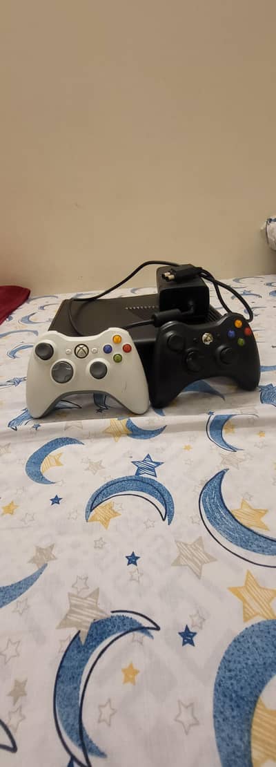 Xbox 360 silm with two controllers