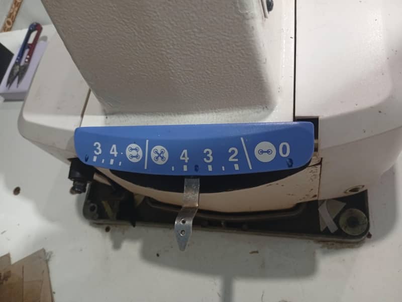 button attaching machine 3