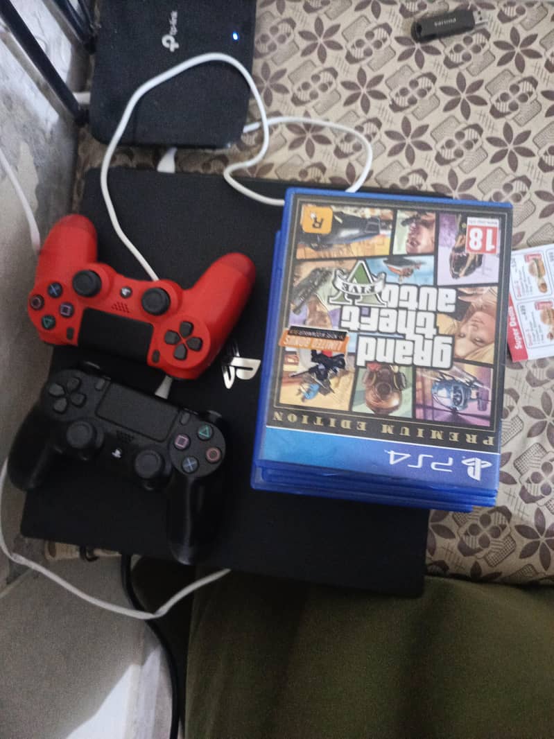 ps4 pro with games  with two controller 0